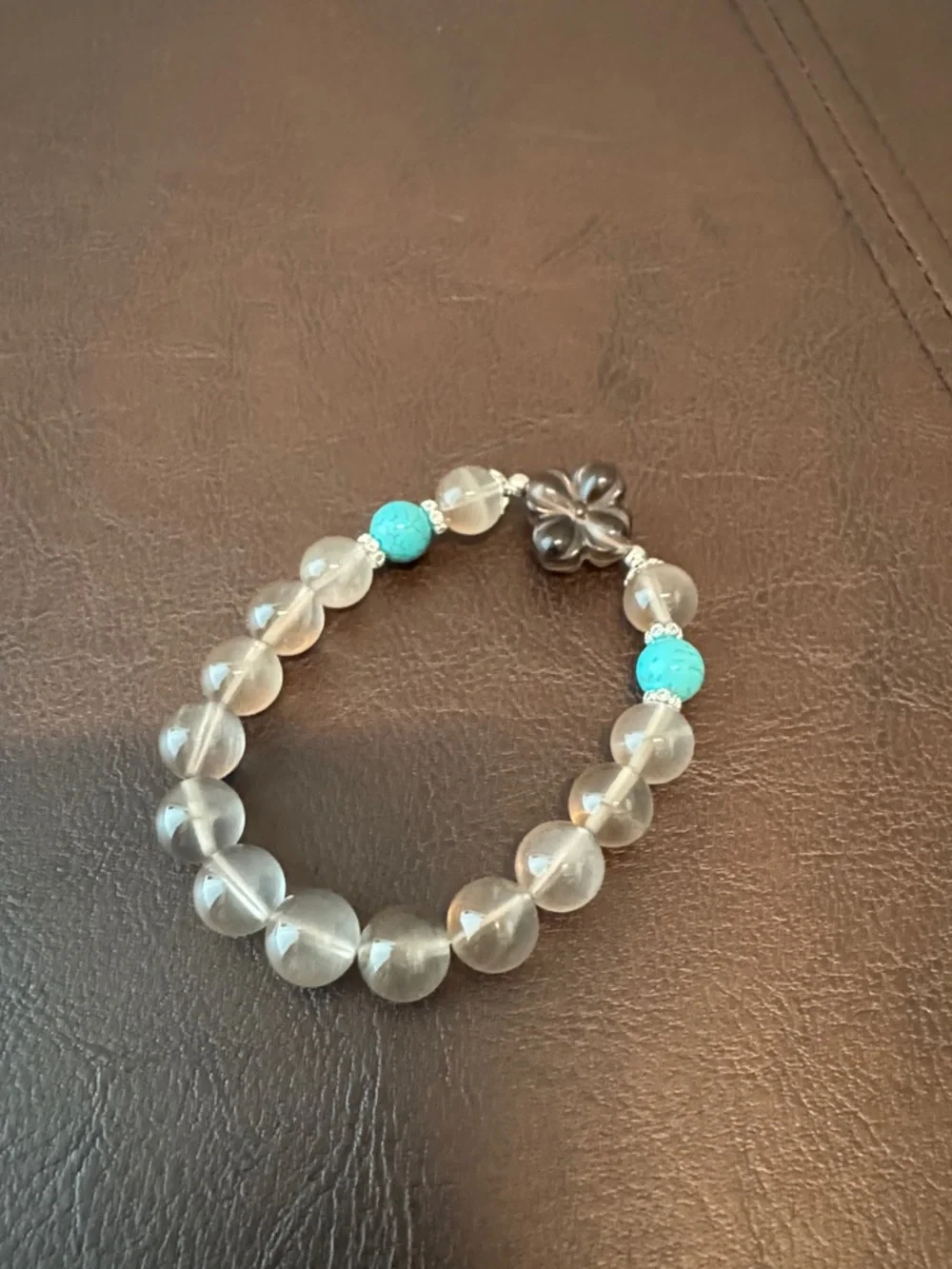 Clear Quartz Beaded Bracelet with Turquoise Accent and Flower Charm